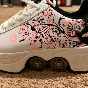 Shoes with moveable wheels